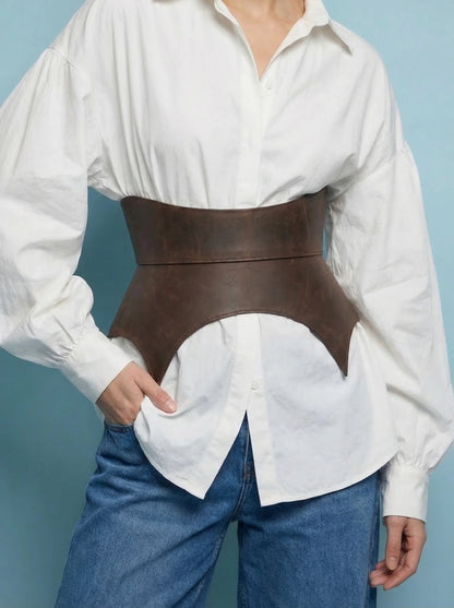 brown leather peplum belt cutout basque waist belt structured waist cincher style leather belt minimalist outfit styling modern fashion look