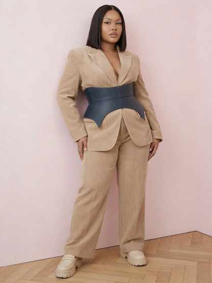 blue leather basque belt cutout peplum waist belt structured waist belt sculpted leather belt denim outfit styling statement fashion waist belt