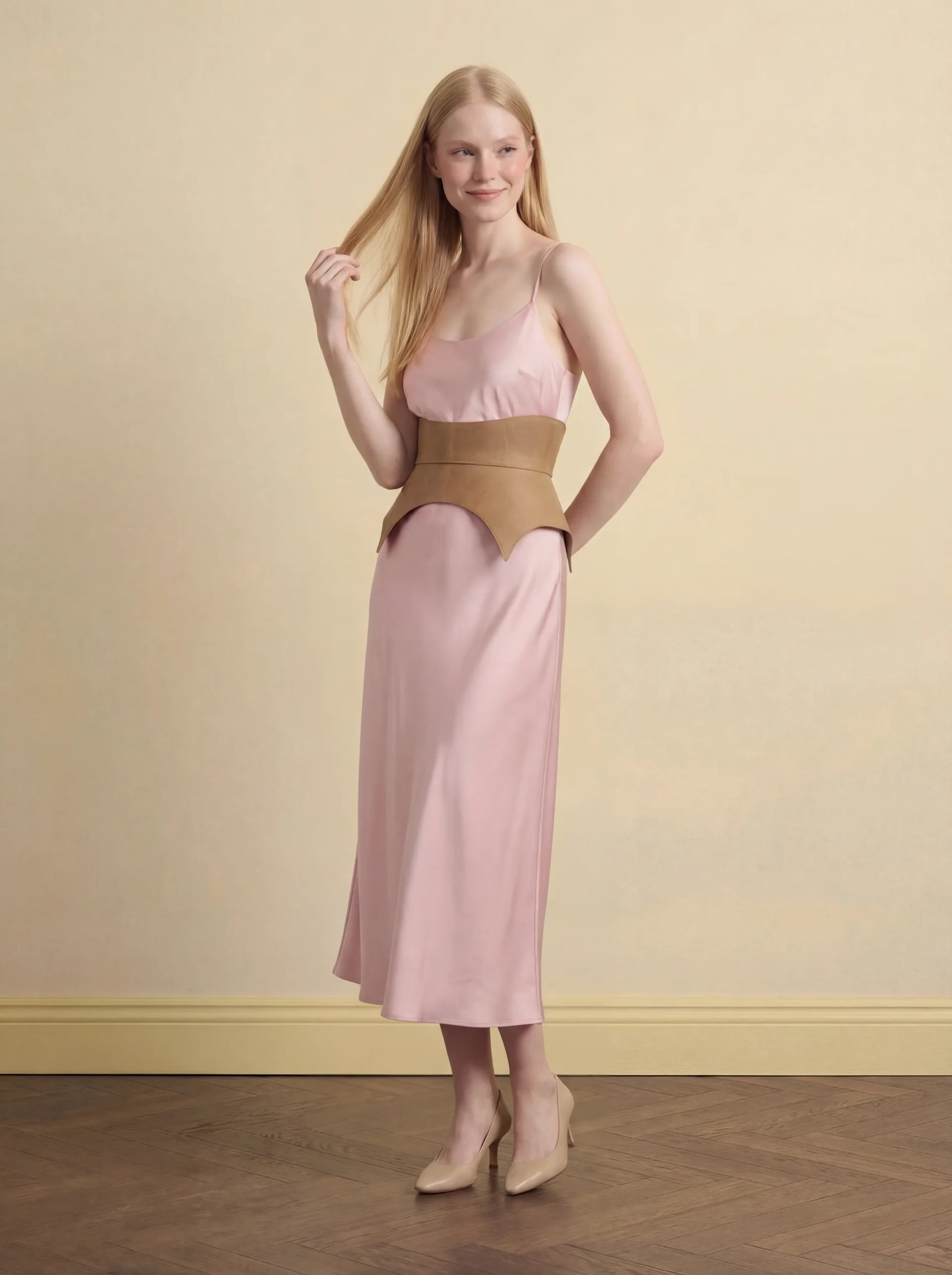 beige leather basque belt cutout peplum waist belt structured waist belt neutral leather belt minimalist outfit styling statement waist belt modern fashion