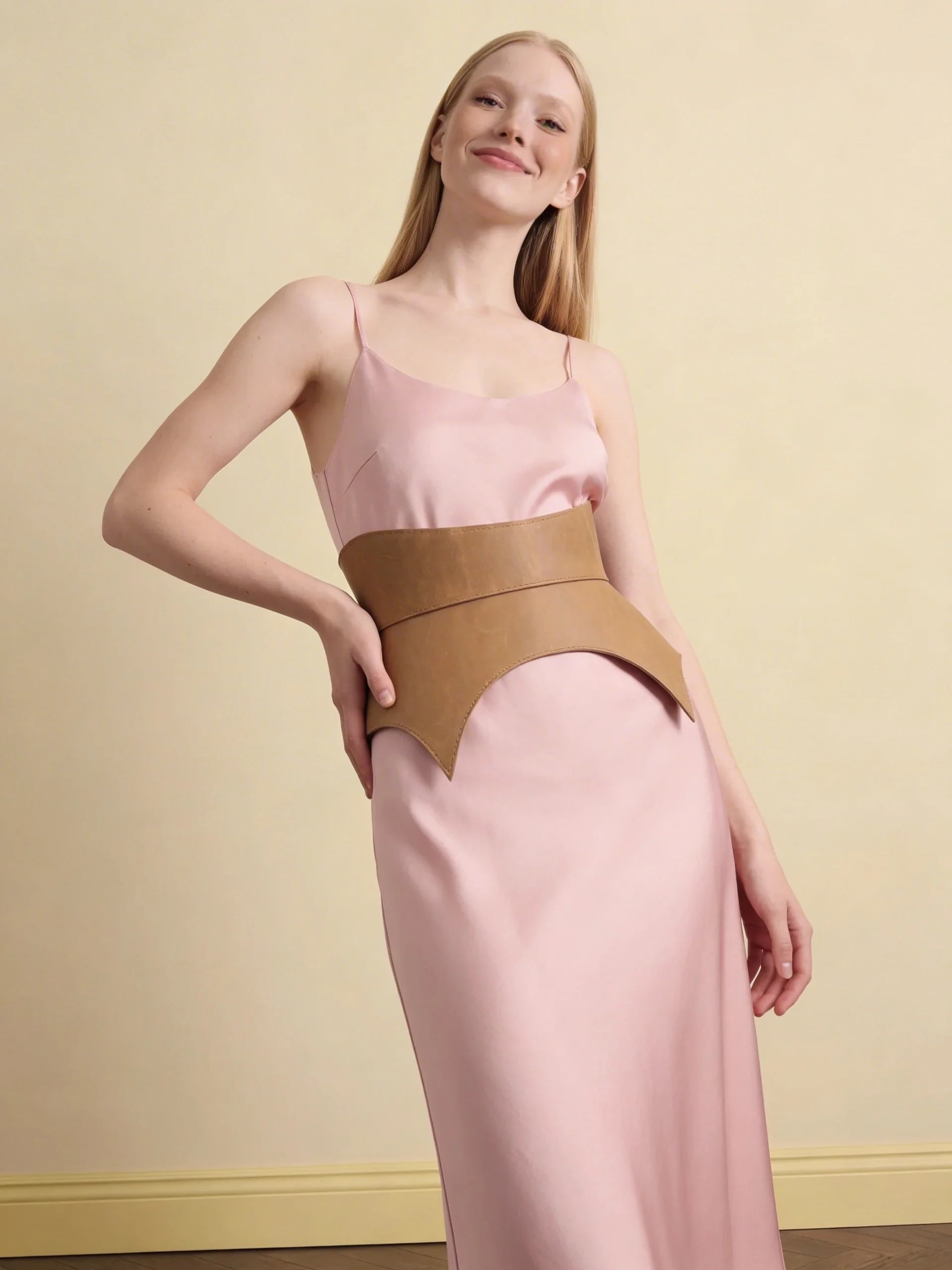 beige leather basque belt cutout peplum waist belt structured waist belt neutral leather belt minimalist outfit styling statement waist belt modern fashion