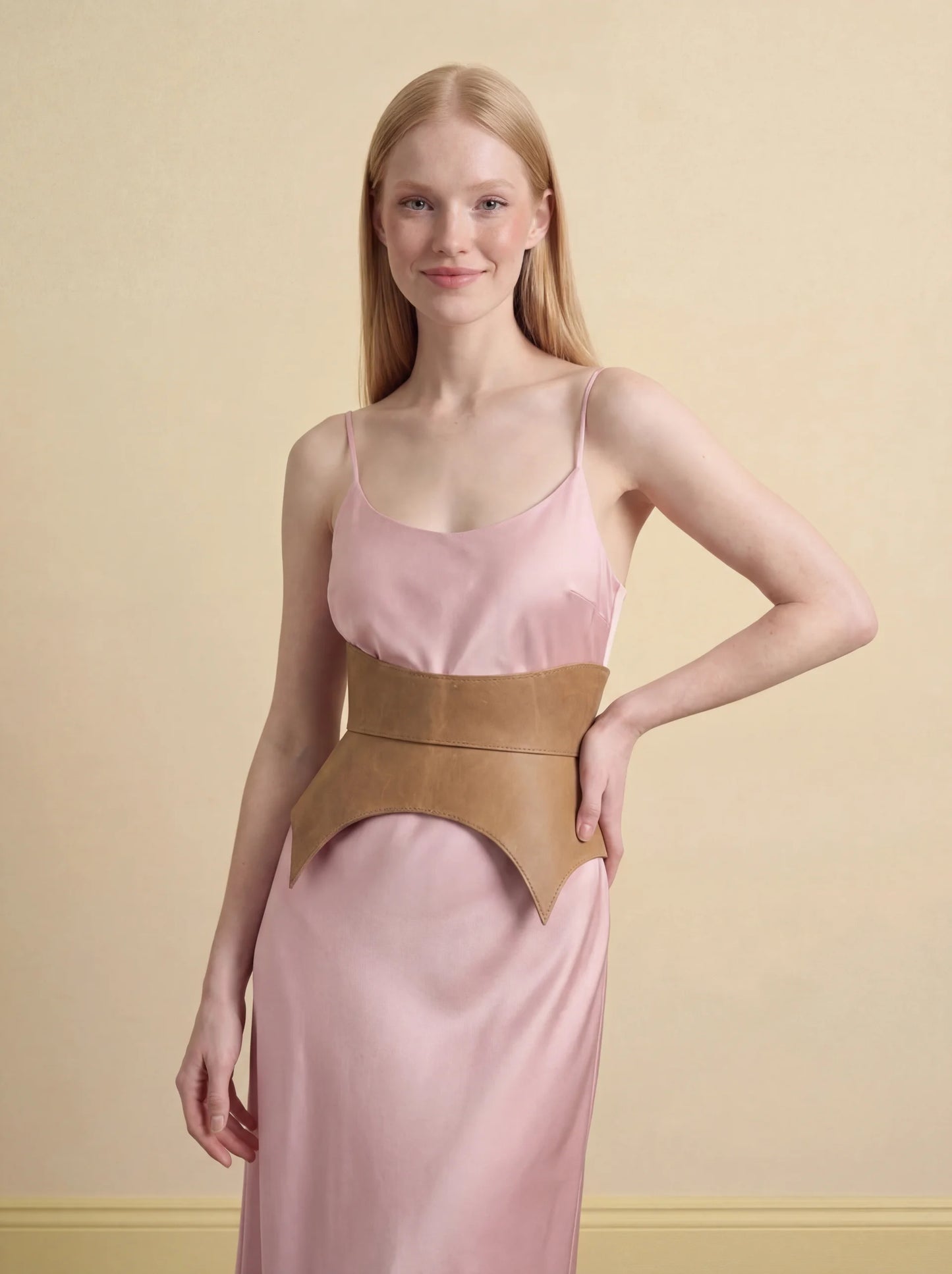 beige leather basque belt cutout peplum waist belt structured waist belt neutral leather belt minimalist outfit styling statement waist belt modern fashion