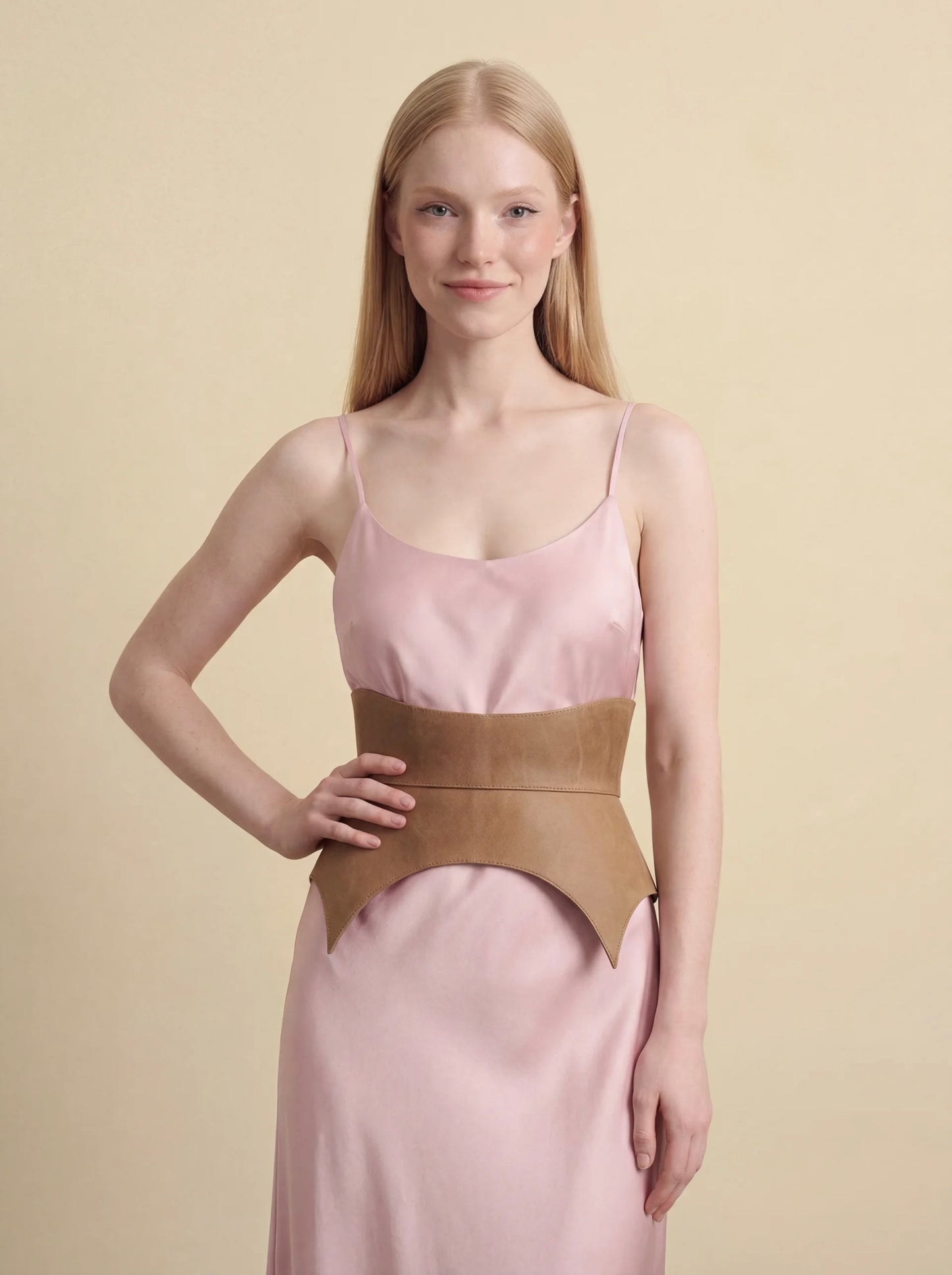 beige leather basque belt cutout peplum waist belt structured waist belt neutral leather belt minimalist outfit styling statement waist belt modern fashion