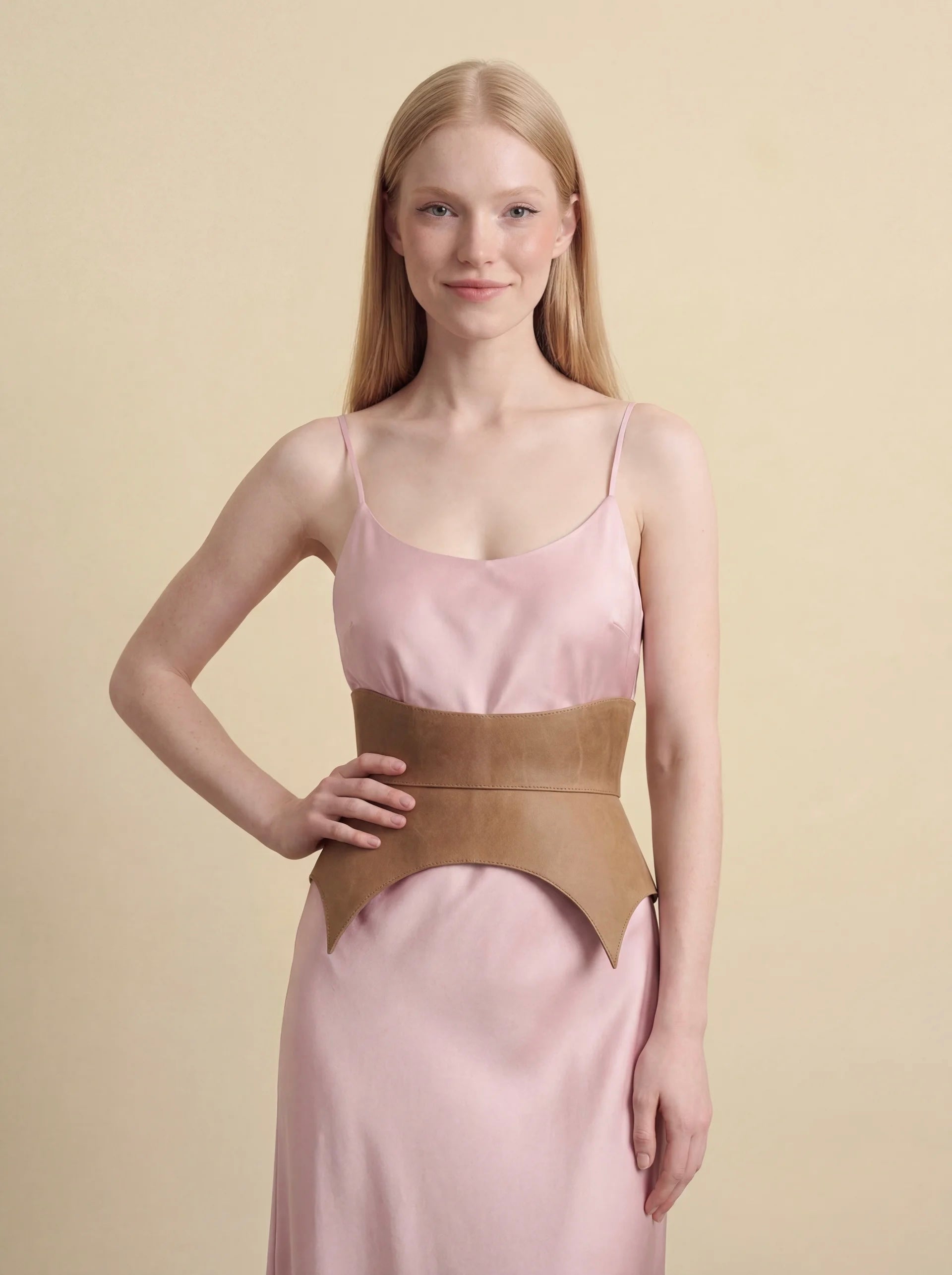 beige leather basque belt cutout peplum waist belt structured waist belt neutral leather belt minimalist outfit styling statement waist belt modern fashion