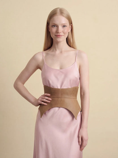 beige leather basque belt cutout peplum waist belt structured waist belt neutral leather belt minimalist outfit styling statement waist belt modern fashion