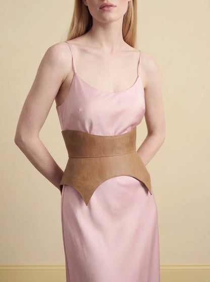 beige leather basque belt cutout peplum waist belt structured waist belt neutral leather belt minimalist outfit styling statement waist belt modern fashion