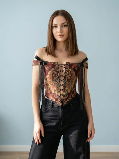 gold floral corset top reversible, lace up corset front and back, tapestry corset with gold flowers pattern, black reversible corset top, structured overbust corset for waist shaping, adjustable corset top custom size, elegant gold corset outfit aesthetic, feminine silhouette shaping corset, two sided corset gold and black, ditogs corsets gold flowers design