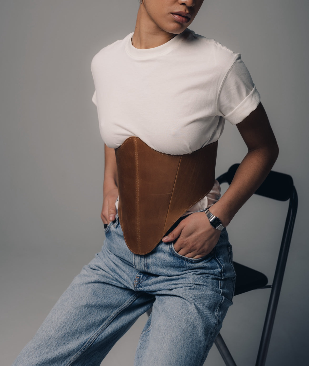 Close seated styling with beige long leather underbust corset belt