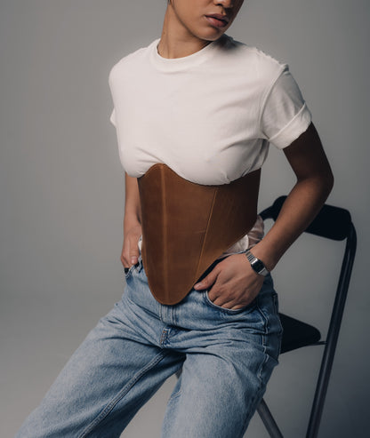 Close seated styling with beige long leather underbust corset belt