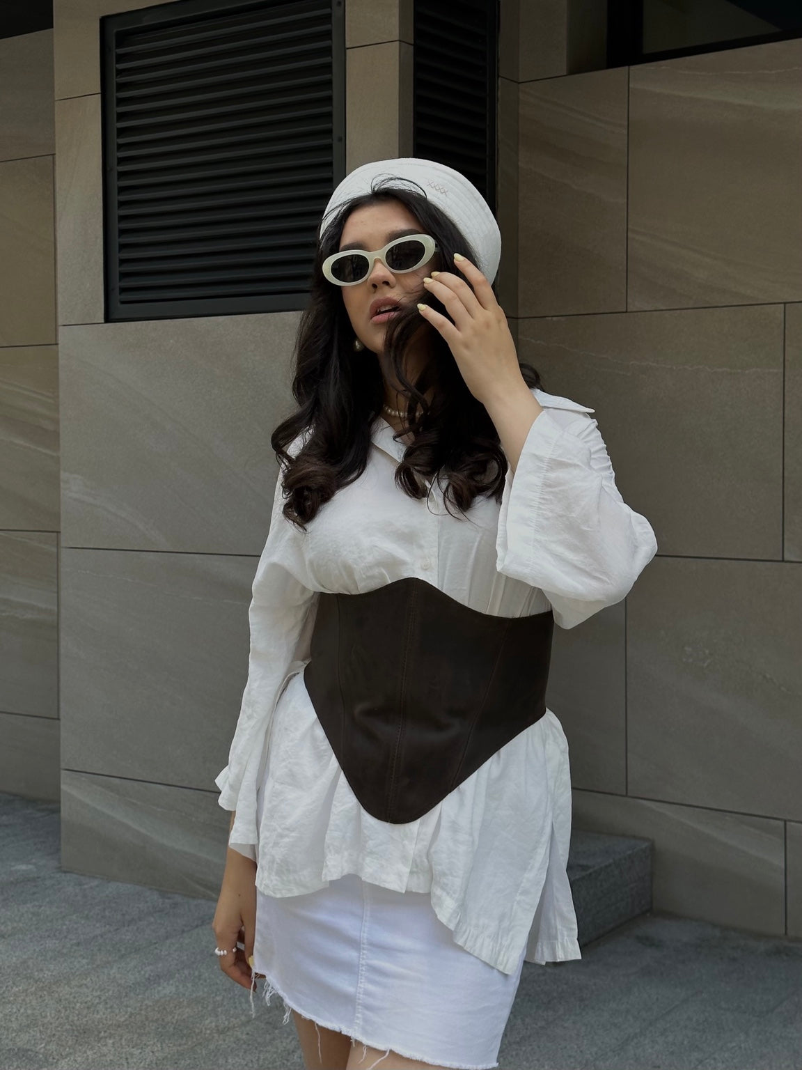Brown long leather underbust corset belt portrait styling with white shirt