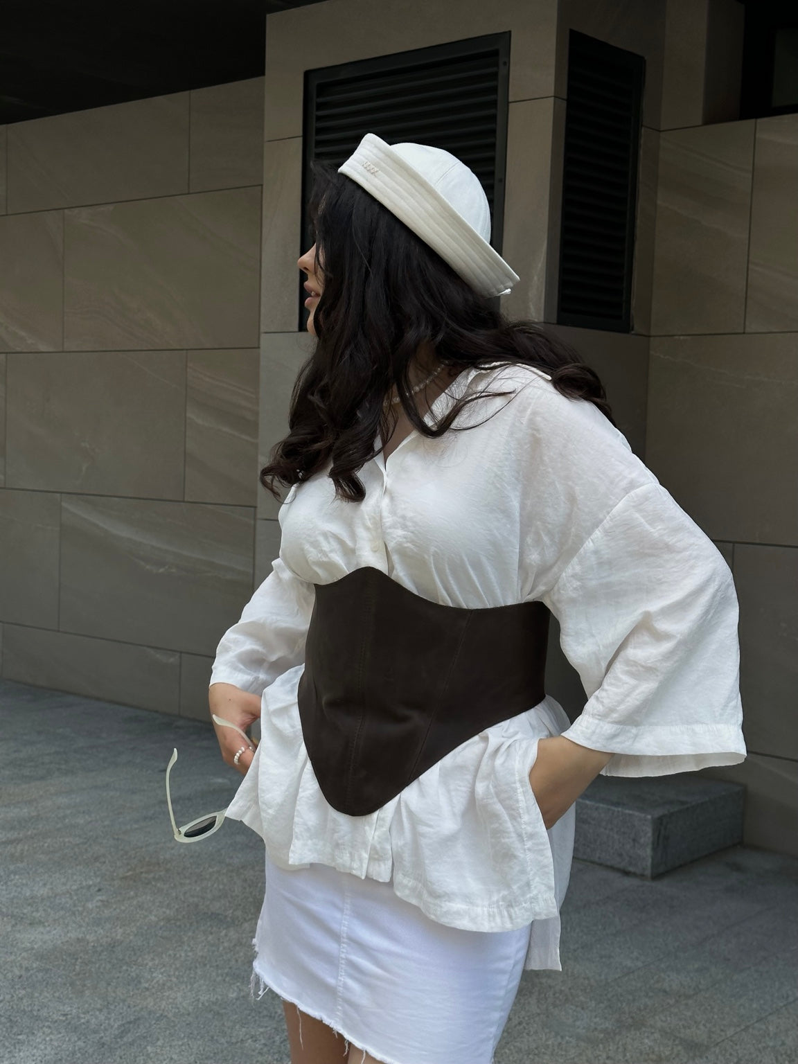 Side view brown long leather underbust corset belt