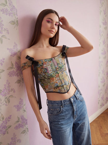 City print jacquard corset top seated styling with jeans