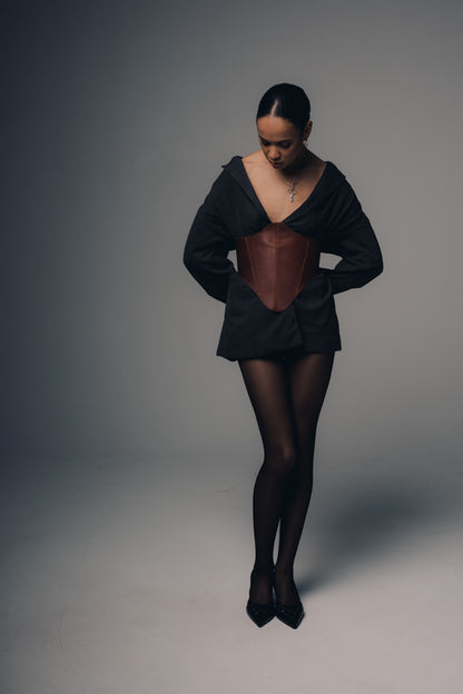 Cognac long leather underbust corset belt looking down pose