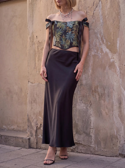 Dark tropical jacquard corset top styled with black satin skirt