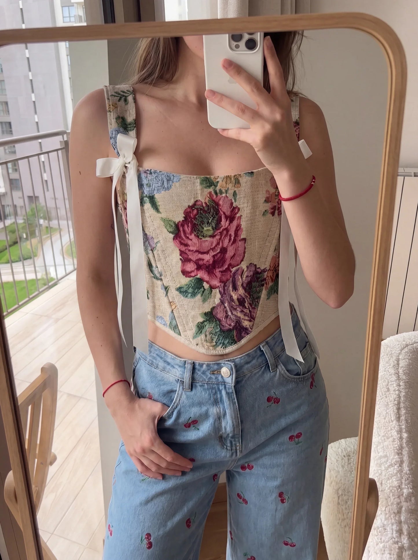 Floral jacquard corset top close detail with beige binding