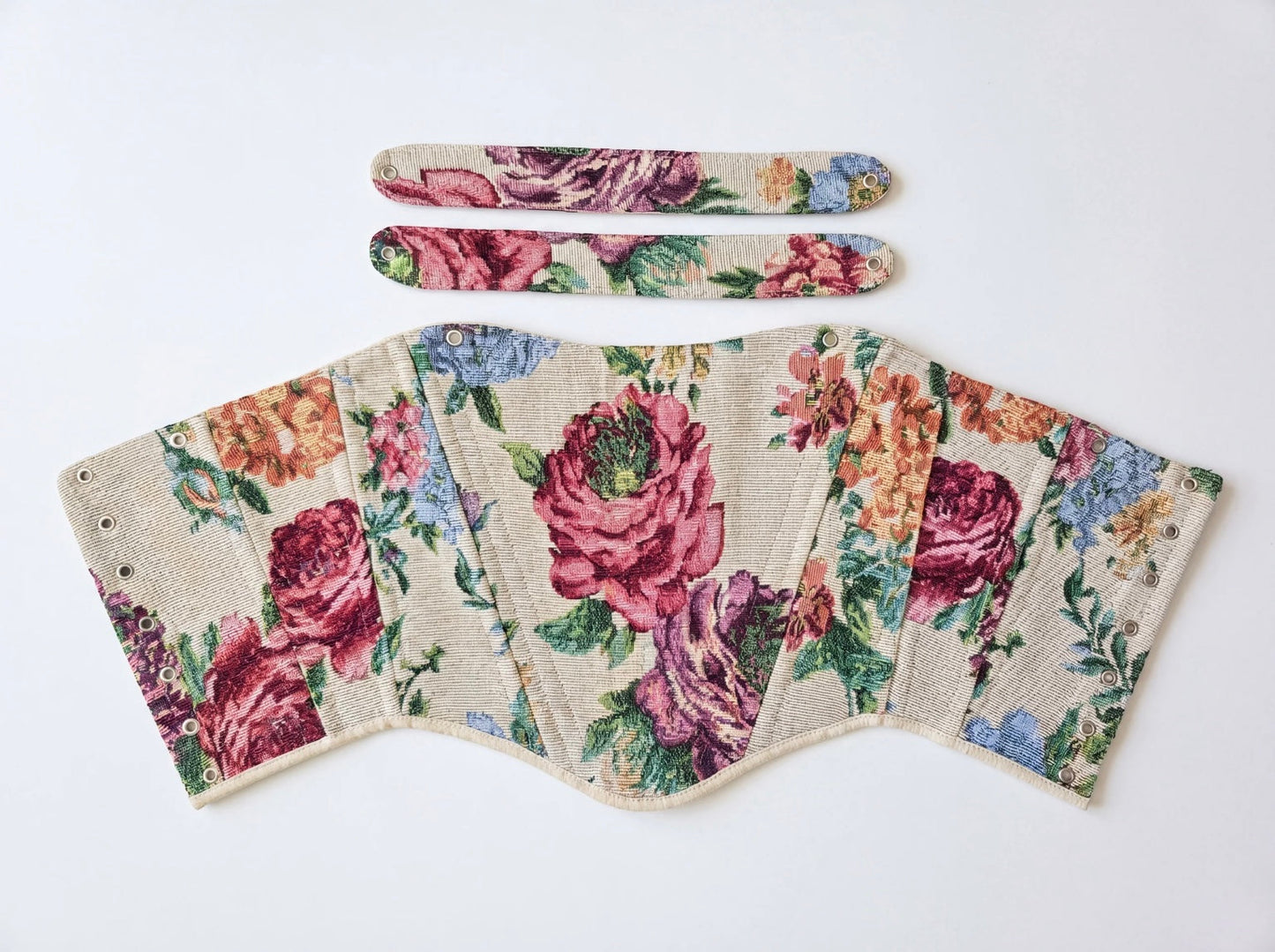Reversible floral jacquard corset top with beige denim reverse side flat lay