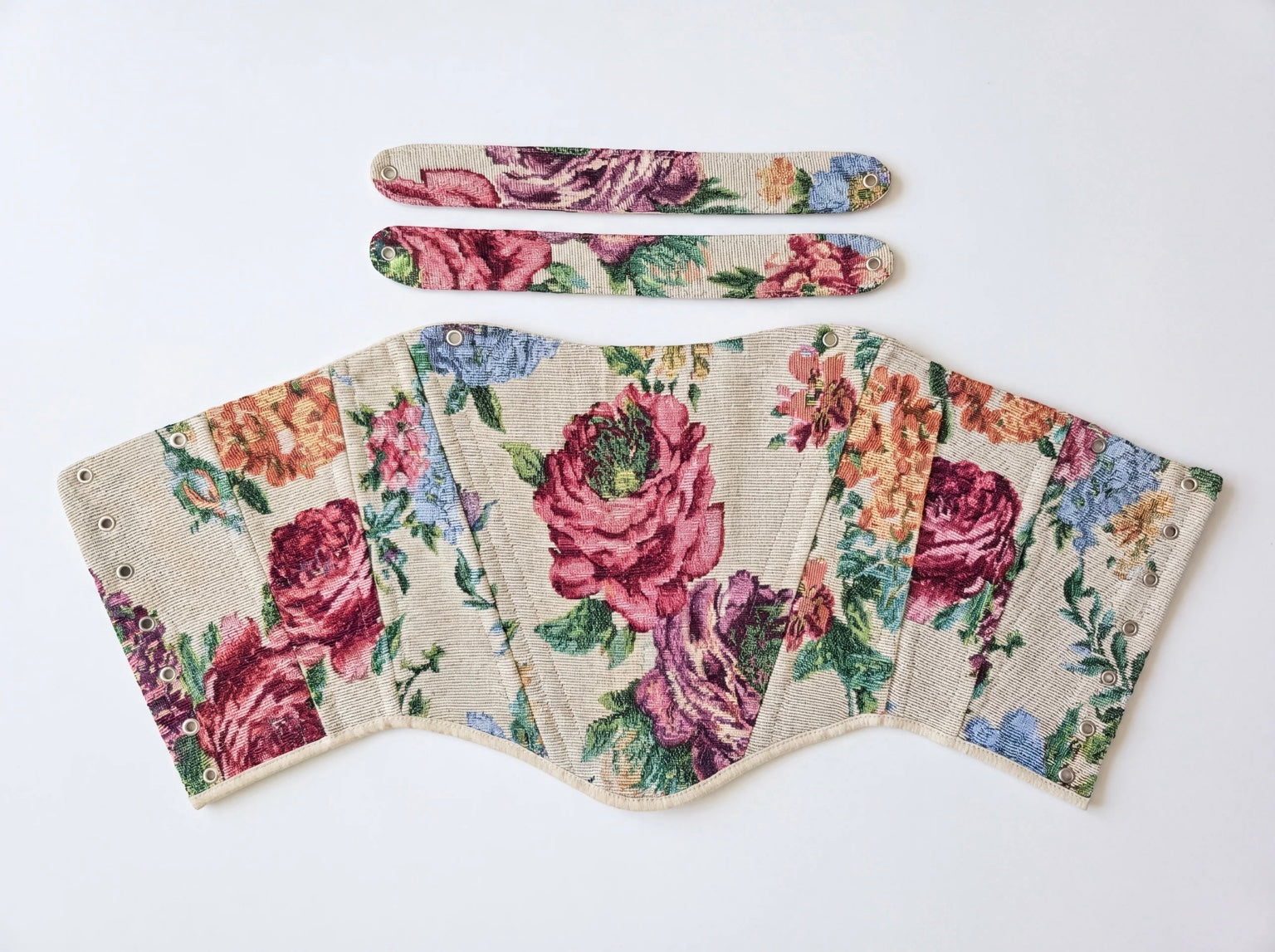 Reversible floral jacquard corset top with beige denim reverse side flat lay