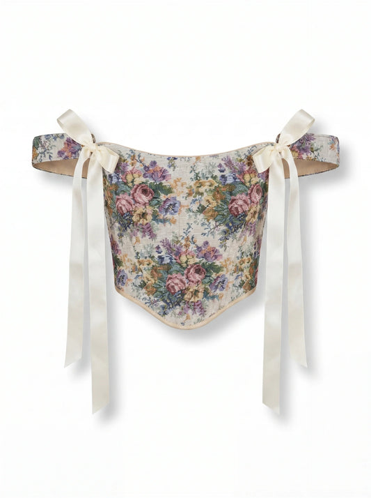 Pastel floral jacquard reversible corset top with cream ribbon ties on white background