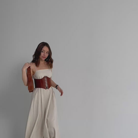 leather corset belt, boned waist cincher, structured waist shaping belt, lace up corset belt, handmade leather waist belt, sculpted corset belt, underbust style belt, architectural waist corset, adjustable lace back belt